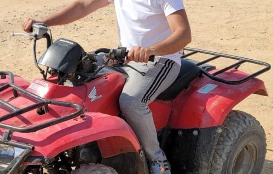 ATV Quad Bike at Sahara Desert pyramids view