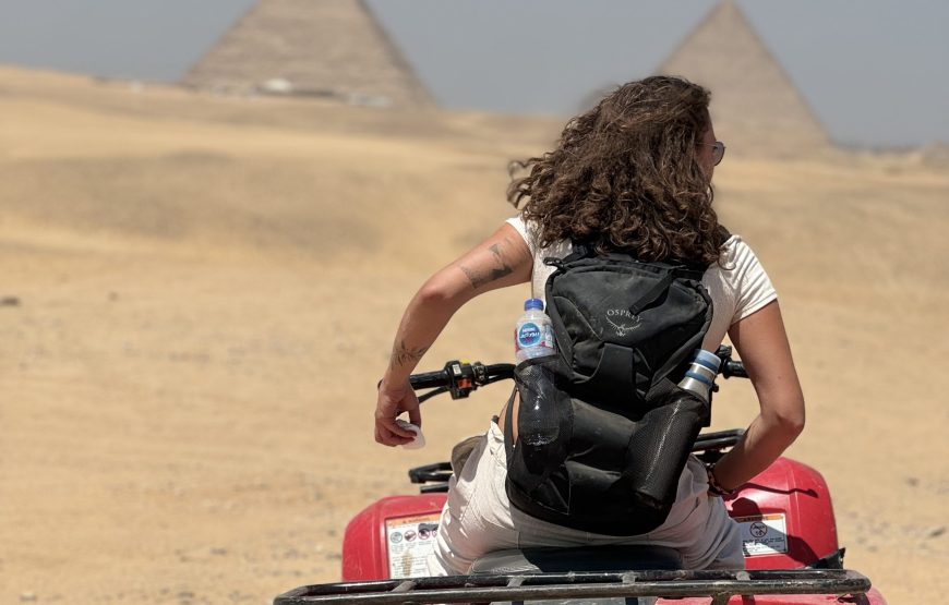 ATV Quad Bike at Sahara Desert pyramids view