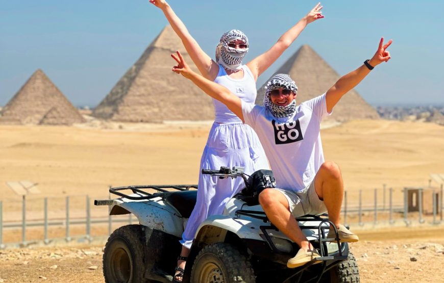 ATV Quad Bike at Sahara Desert pyramids view