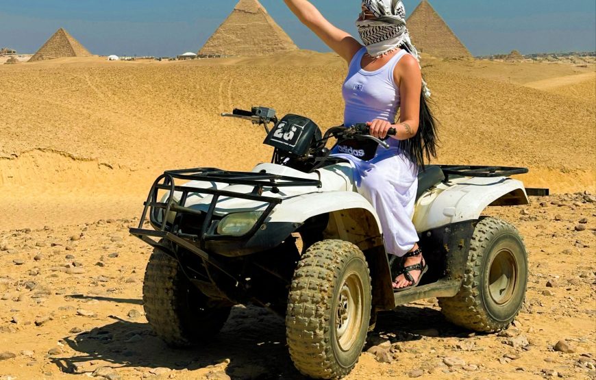 ATV Quad Bike at Sahara Desert pyramids view