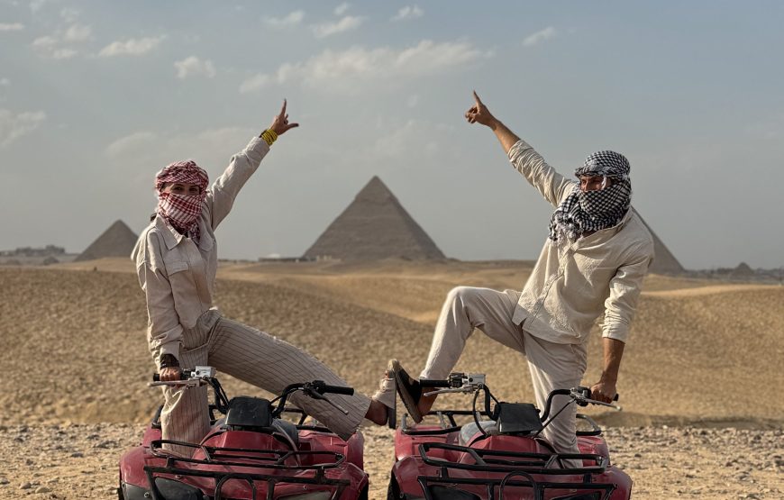 ATV Quad Bike at Sahara Desert pyramids view