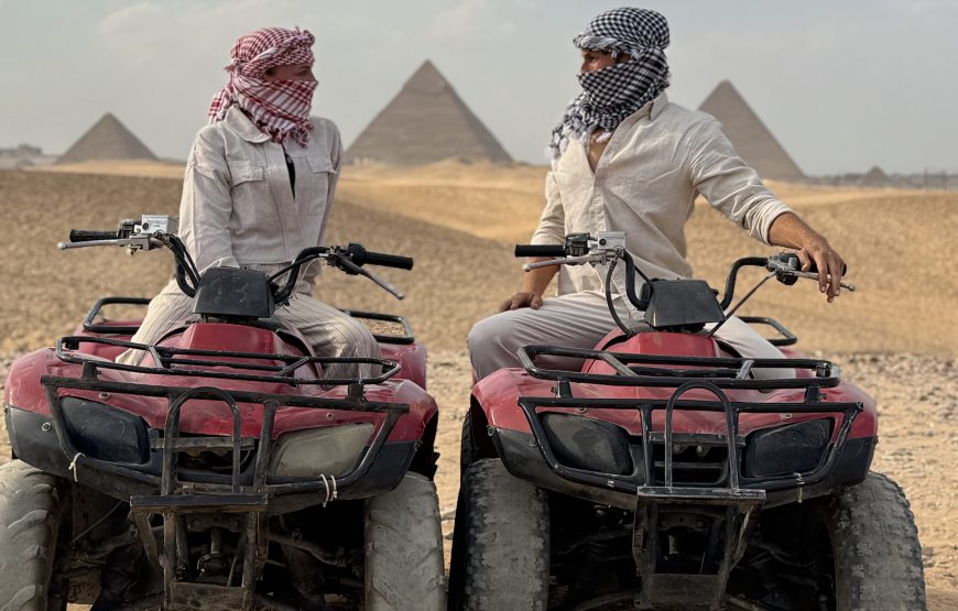 ATV Quad Bike at Sahara Desert pyramids view