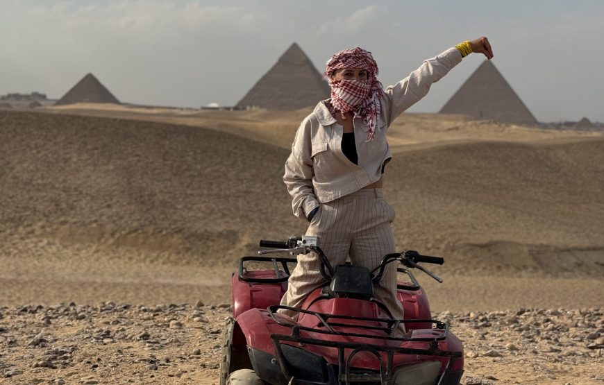 ATV Quad Bike at Sahara Desert pyramids view
