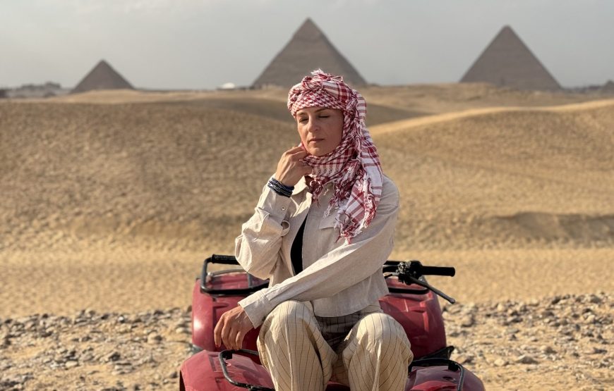 ATV Quad Bike at Sahara Desert pyramids view