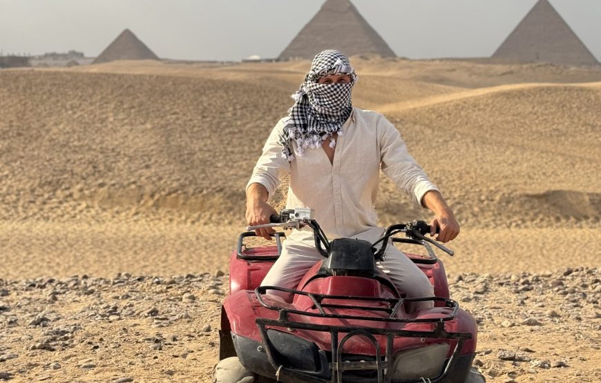 ATV Quad Bike at Sahara Desert pyramids view