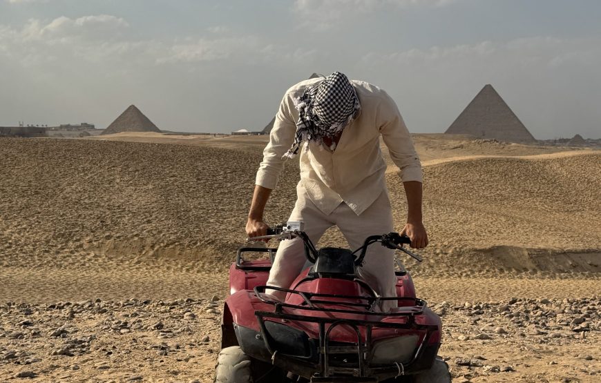 ATV Quad Bike at Sahara Desert pyramids view