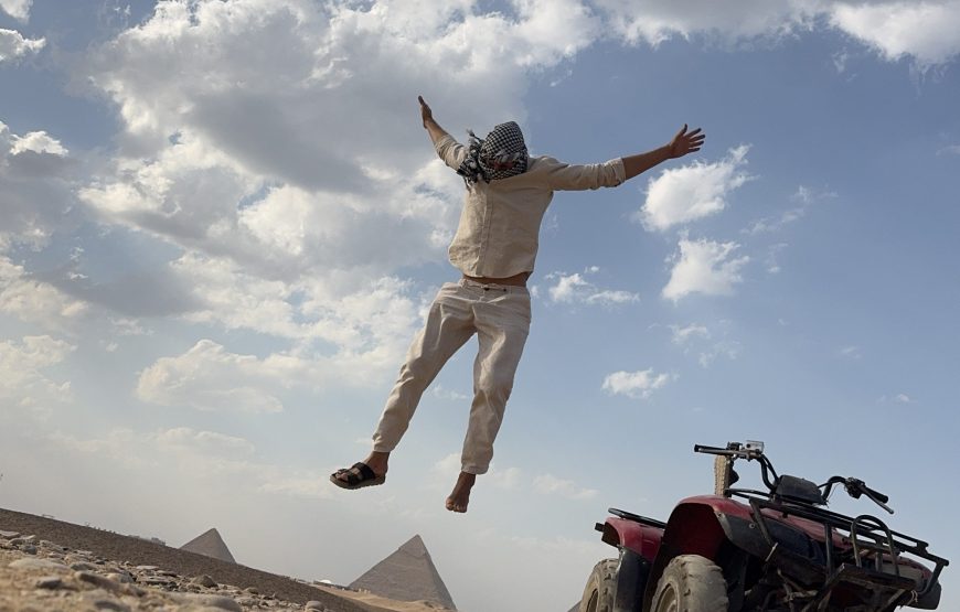 ATV Quad Bike at Sahara Desert pyramids view