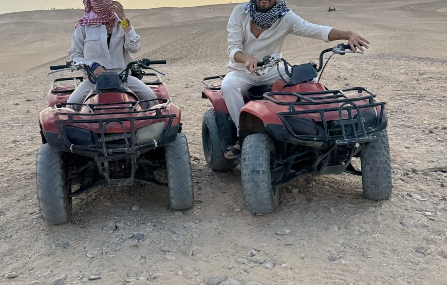 ATV Quad Bike at Sahara Desert pyramids view