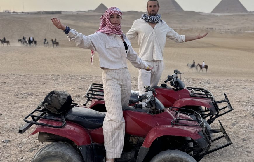 ATV Quad Bike at Sahara Desert pyramids view