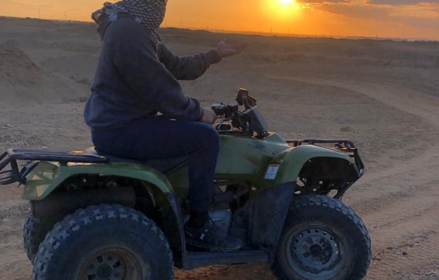 ATV Quad Bike at Sahara Desert pyramids view