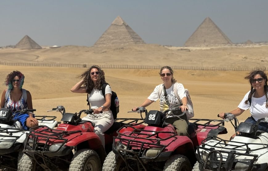 ATV Quad Bike at Sahara Desert pyramids view