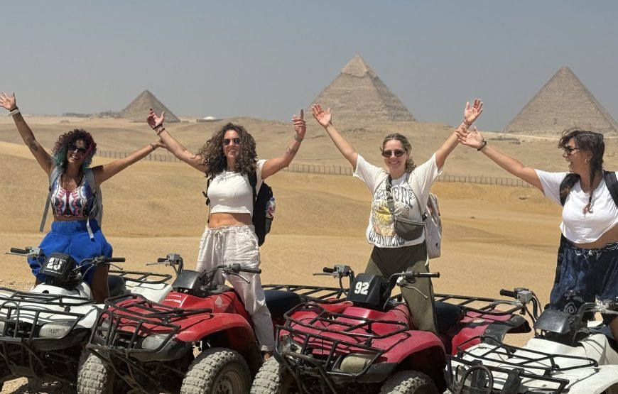 ATV Quad Bike at Sahara Desert pyramids view