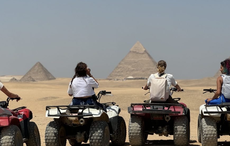 ATV Quad Bike at Sahara Desert pyramids view