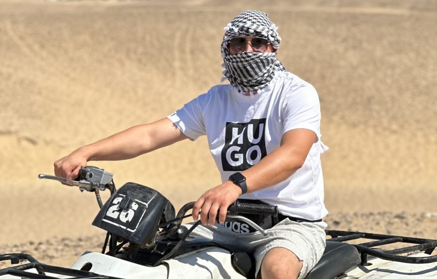 ATV Quad Bike at Sahara Desert pyramids view