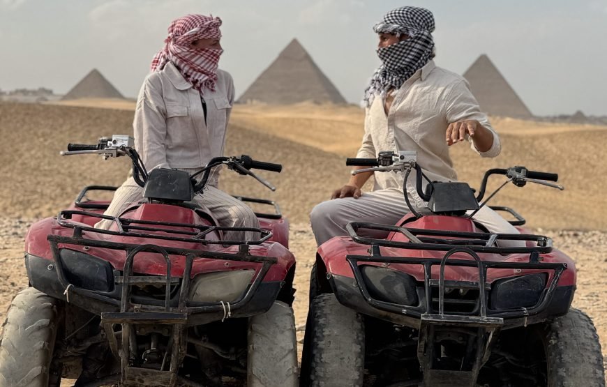 ATV Quad Bike at Sahara Desert pyramids view