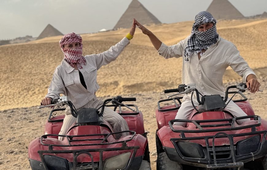 ATV Quad Bike at Sahara Desert pyramids view