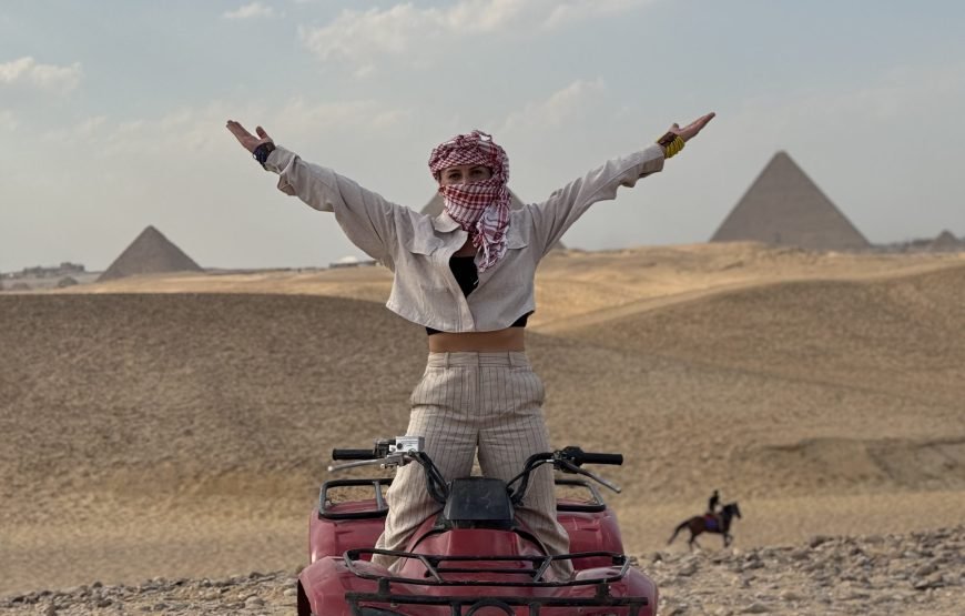 ATV Quad Bike at Sahara Desert pyramids view