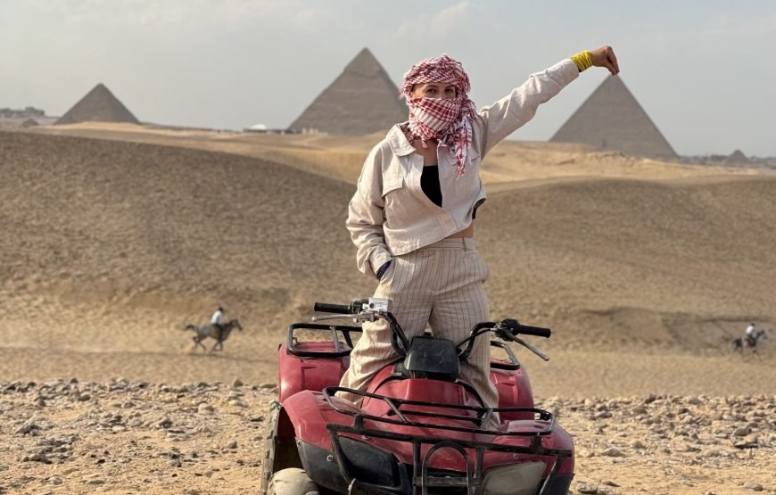 ATV Quad Bike at Sahara Desert pyramids view