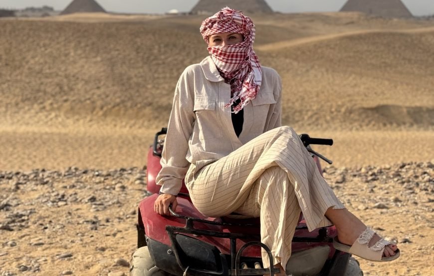 ATV Quad Bike at Sahara Desert pyramids view