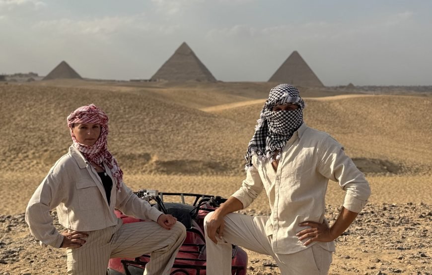ATV Quad Bike at Sahara Desert pyramids view