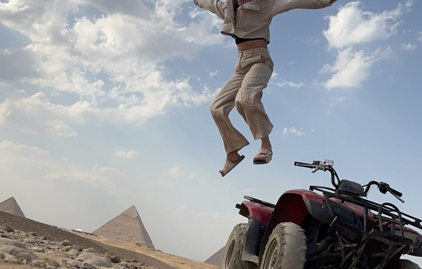ATV Quad Bike at Sahara Desert pyramids view