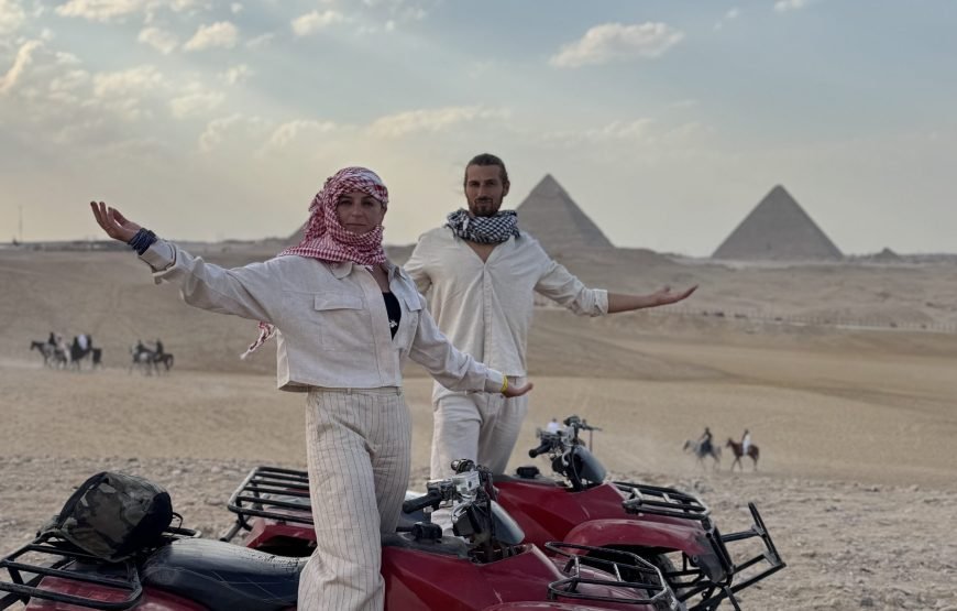 ATV Quad Bike at Sahara Desert pyramids view