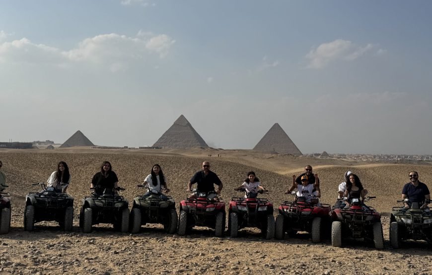 ATV Quad Bike at Sahara Desert pyramids view