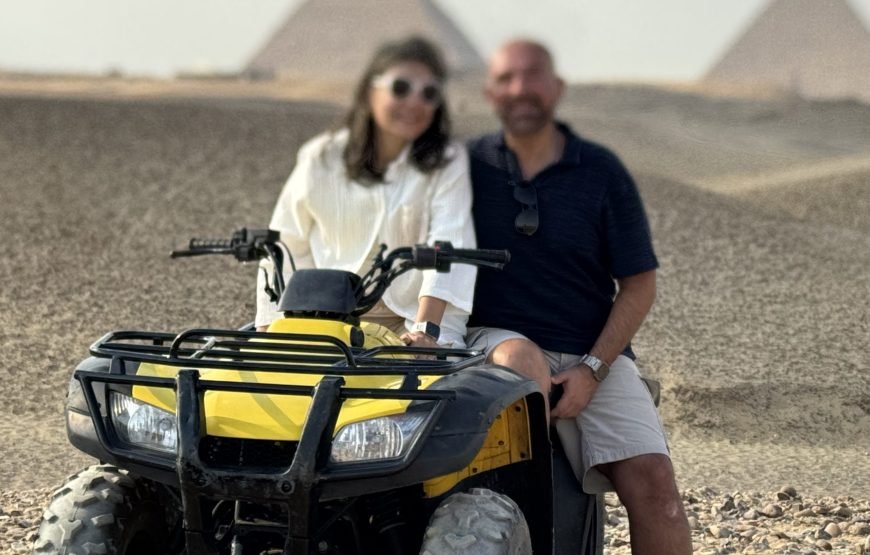 ATV Quad Bike at Sahara Desert pyramids view