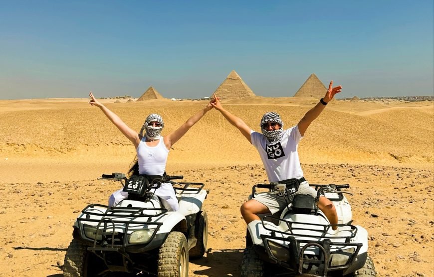 ATV Quad Bike at Sahara Desert pyramids view