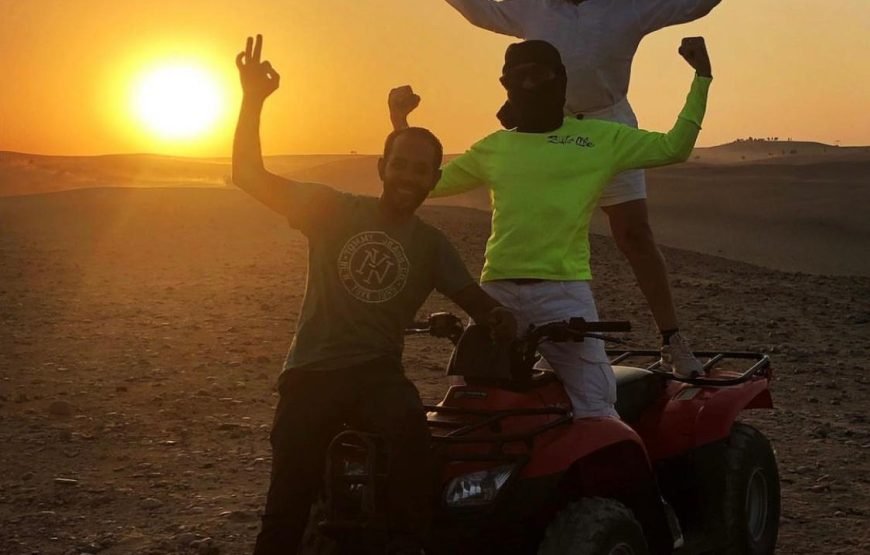 ATV Quad Bike at Sahara Desert pyramids view