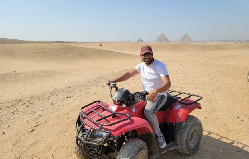 ATV Quad Bike at Sahara Desert pyramids view